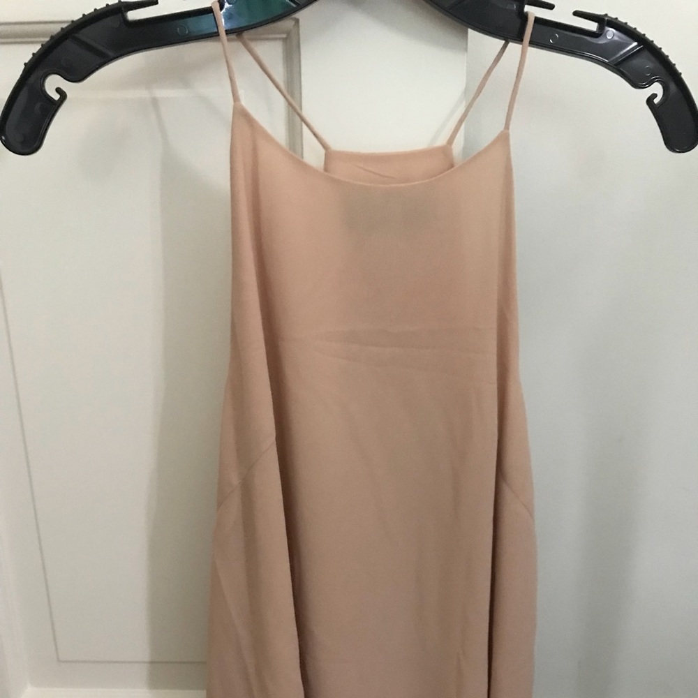 Tan/light pink sleeveless blouse